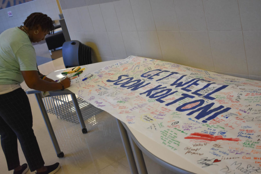 Students and teachers come together and create a get well soon banner for Kolton. 